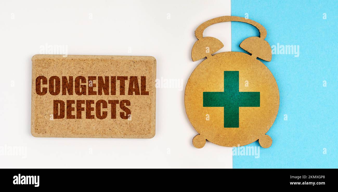 Medicine and health concept. On the white and blue surface are an alarm