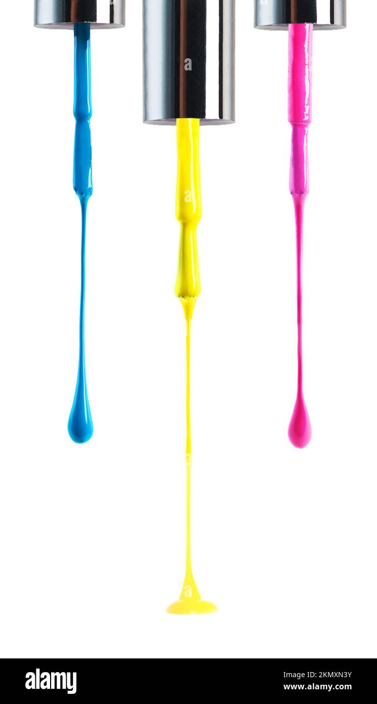 All the colors you need for an 80s party. Multi-coloured nailpolish dripping against white. Stock Photo