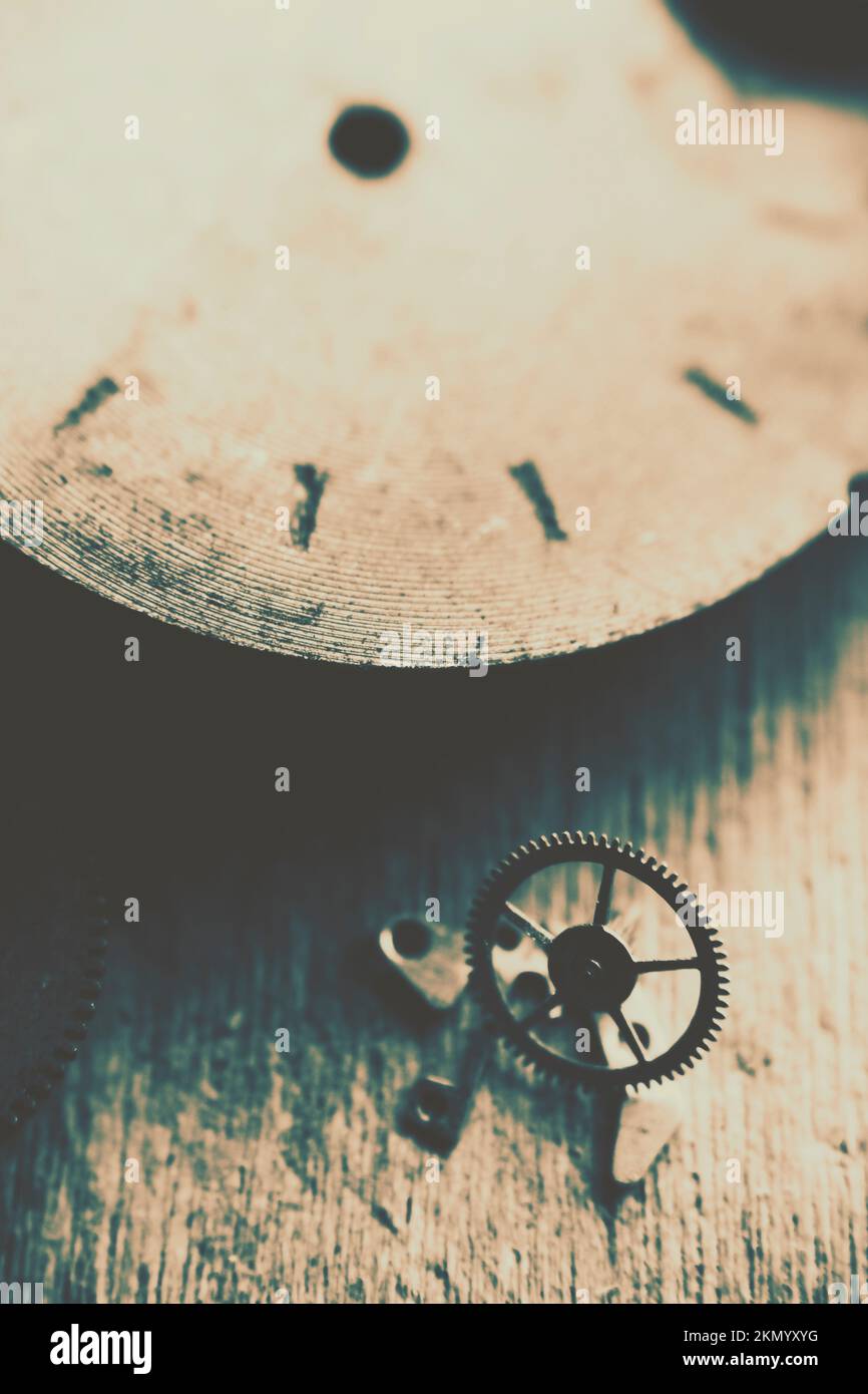 Old macro photography inside the mechanism of an antique clock. Machine