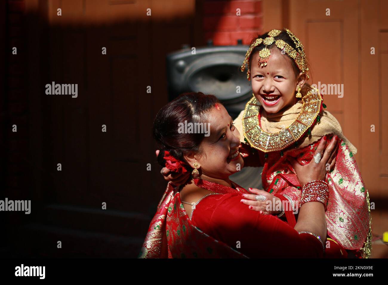 Bhaktapur, Nepal. 27th Nov, 2022. Mother and daughter rejoice after