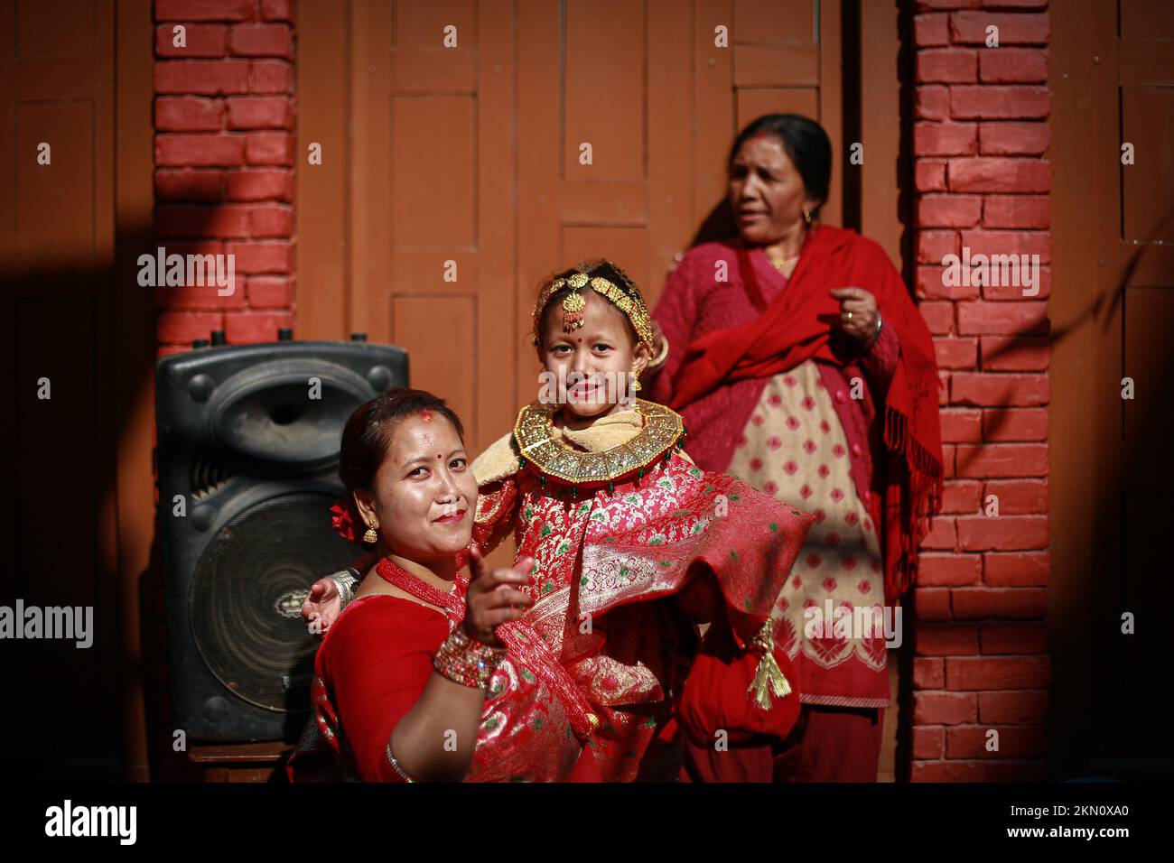 Bhaktapur, Nepal. 27th Nov, 2022. Mother and daughter rejoice after