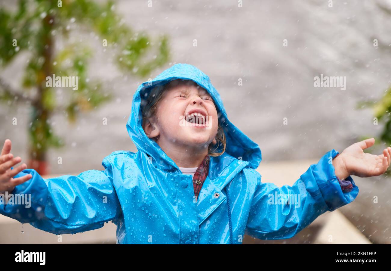 Im singin in the rain...an adorable little girl playing outside in the ...