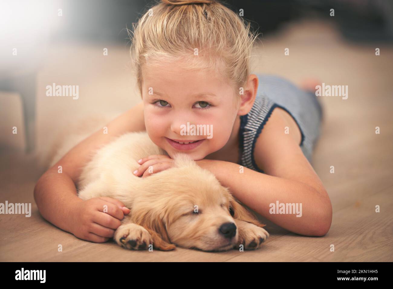 Best Friends Get The Best Cuddles An Adorable Little Girl With Her