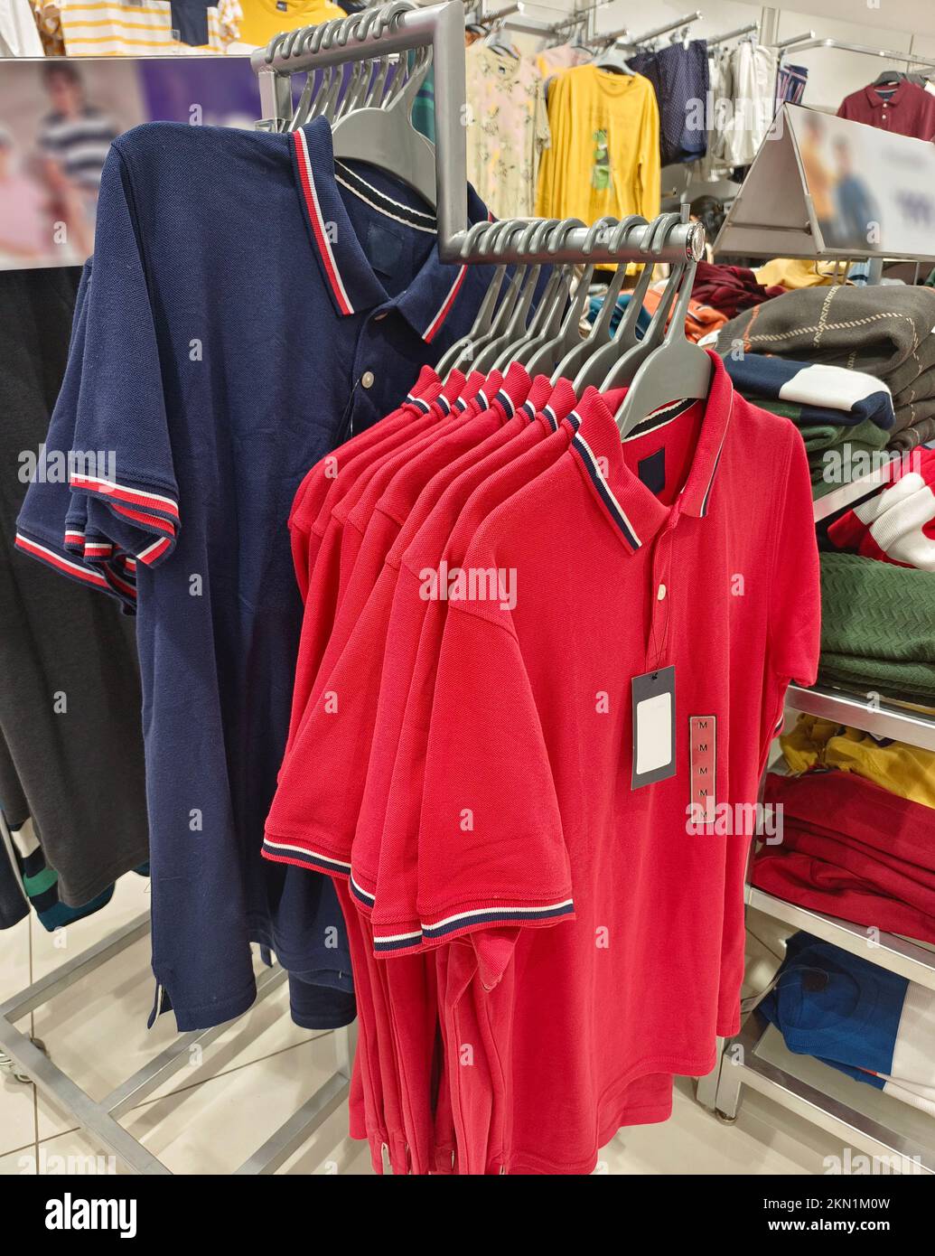 Indian men's latest fashion dress hung on hangers, in a retail store in the market, traditional
