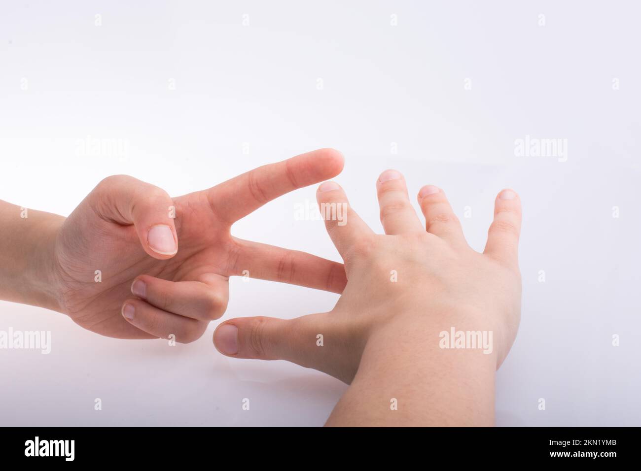 Hands showing the symbols rock paper scissors Stock Photo