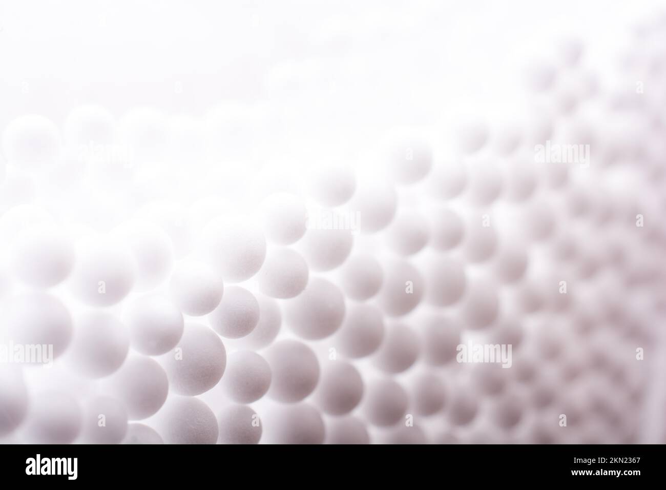 White little polystyrene foam balls as background Stock Photo - Alamy
