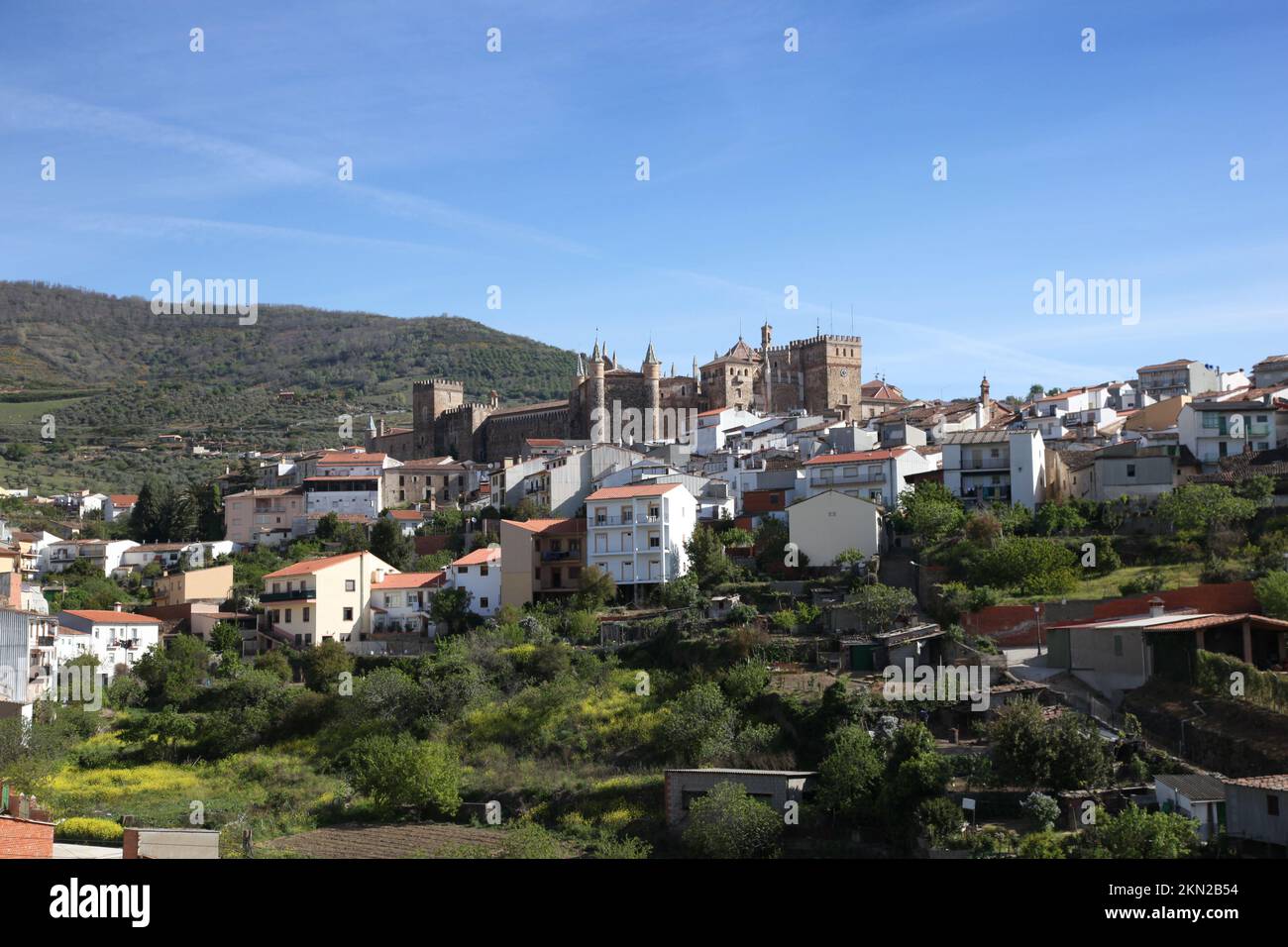 View of Guadalupe town and the historic 'Real Monasterio De Santa Maria' in Guadalupe Extremedura Spain. This monastery is a UNESCO world heritage sit Stock Photo