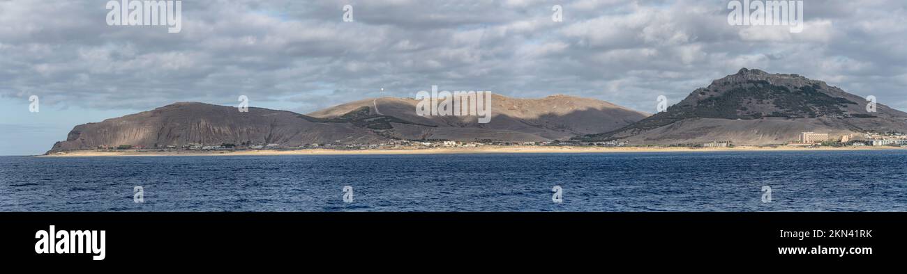 landscape with large beach at Cabeco da Ponta at Porto Santo island, shot from south in bright fall light, Portugal Stock Photo