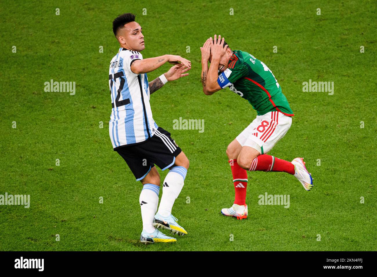 Lusail, Qatar. 14th Sep, 2022. Lusail, Qatar, Nov 26th 2022: Lautaro Martinez of Argentina and Andres Guardado of Mexico during a match between Argentina vs Mexico, valid for the group stage of the World Cup, held at the Estadio Nacional de Lusail in Lusail, Qatar. (Marcio Machado/SPP) Credit: SPP Sport Press Photo. /Alamy Live News Stock Photo