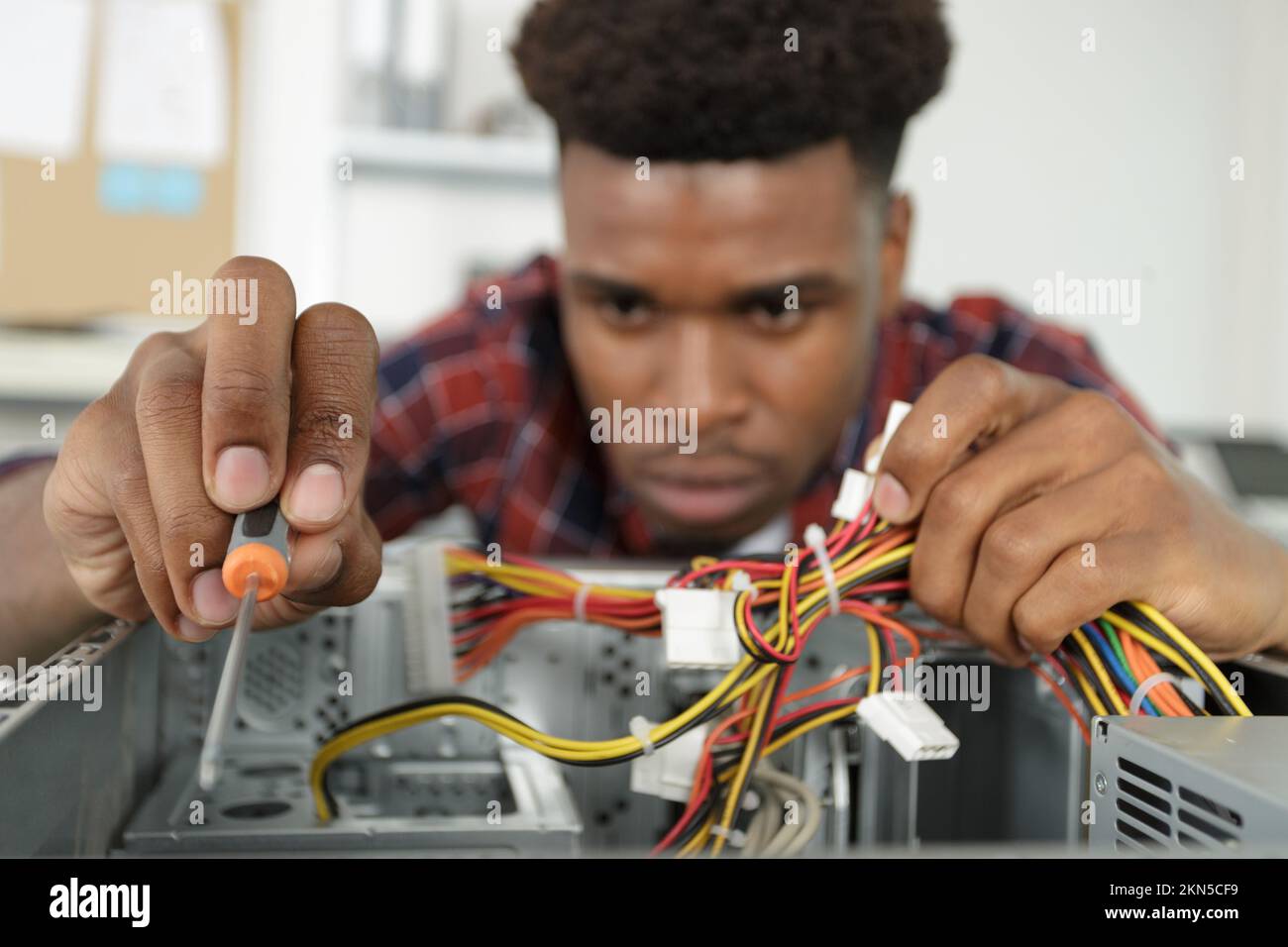 Man repairing motherboard from pc hi-res stock photography and images ...