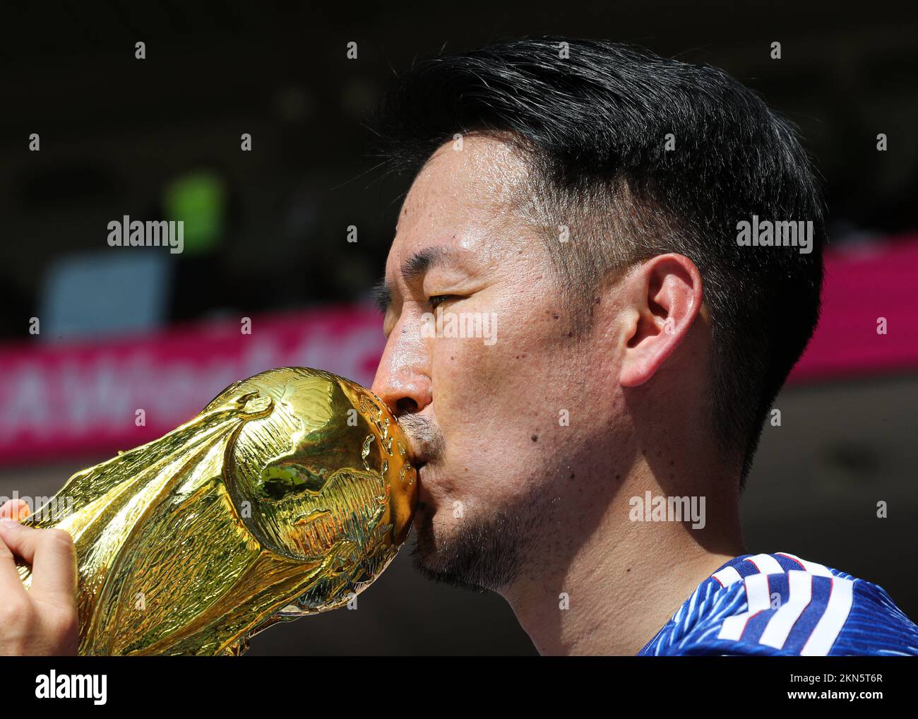 Al Rayyan, Qatar. 27th Nov 2022. 27th November 2022; Ahmed bin Ali Stadium,  Al Rayyan, Qatar; FIFA World Cup Football, Japan versus Costa Rica; Japan  fan kissing a plastic FIFA World Cup