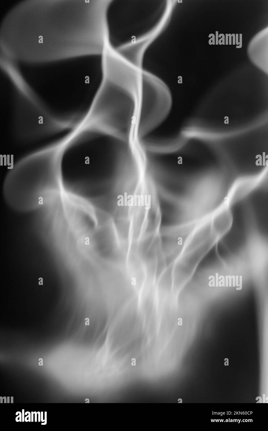 The glowing white smoke on a black background Stock Photo Alamy
