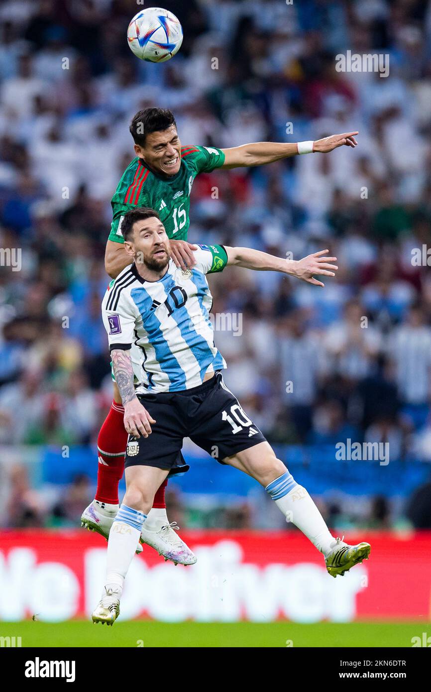 Lusail, Qatar. 26th Nov, 2022. Soccer: World Cup, Argentina - Mexico, Preliminary Round, Group C, Matchday 2, Lusail Iconic Stadium, Mexico's Hector Moreno (top) in action against Argentina's Lionel Messi (bottom). Credit: Tom Weller/dpa/Alamy Live News Stock Photo
