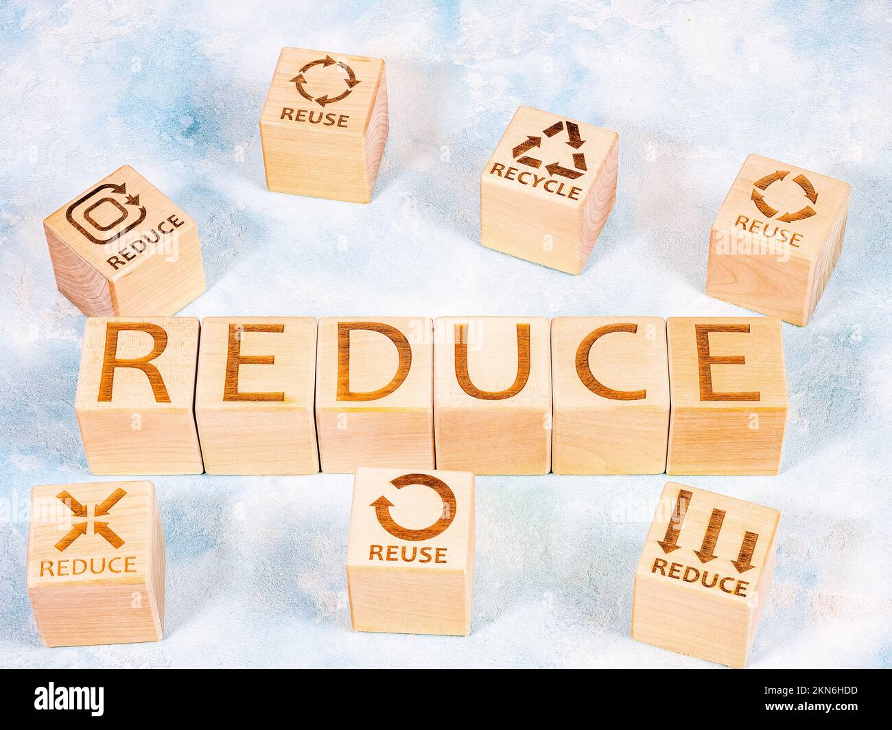 REDUCE, REUSE and RECYCLE symbols as a concept of resource saving and environmental protection Stock Photo
