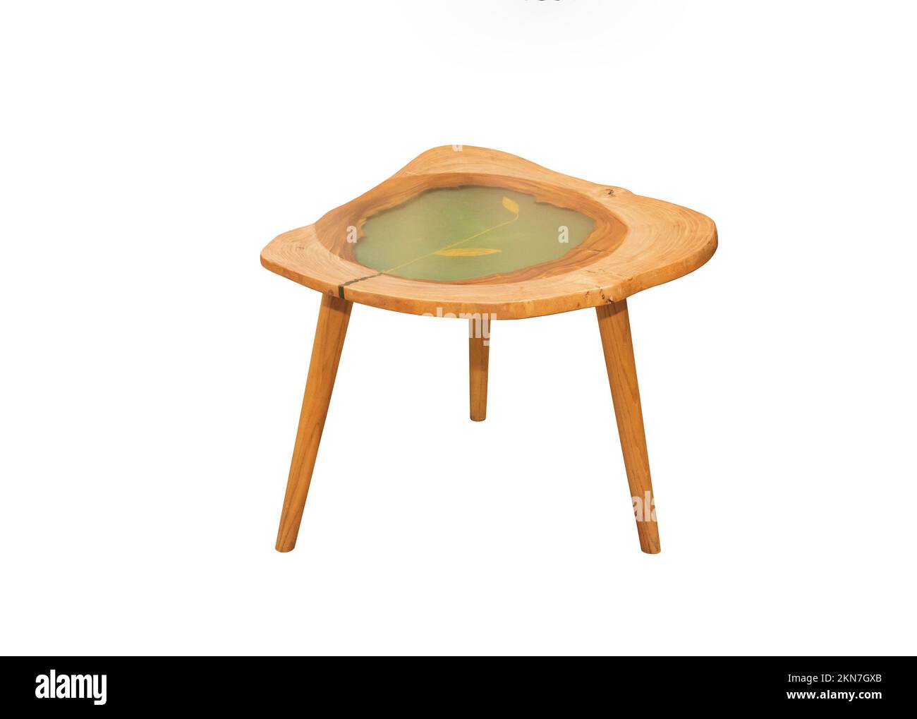 Epoxy table with painted plant on table top. Interior element Stock Photo