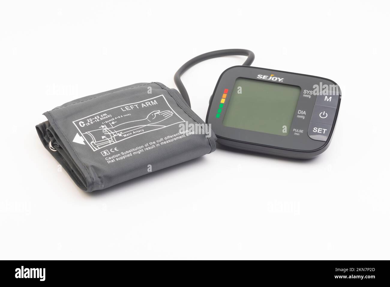 A Joytech Healthcare Sejoy blood pressure monitor and arm cuff Stock Photo