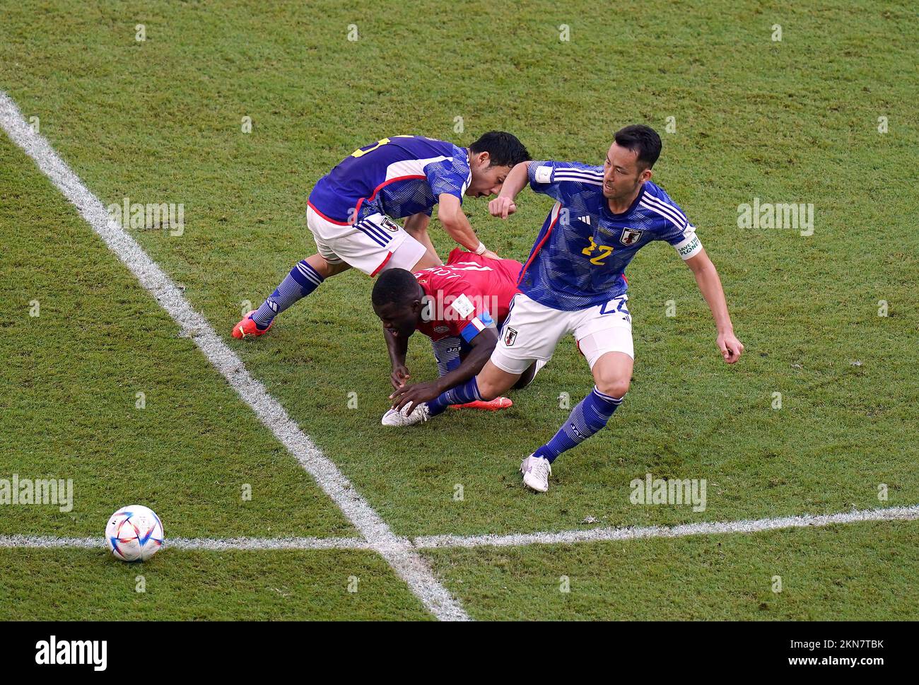 Costa Rica's Joel Campbell and Japan’s Maya Yoshida (right) during the FIFA World Cup Group E match at the Ahmad Bin Ali Stadium, Al-Rayyan, Qatar. Picture date: Sunday November 27, 2022. Stock Photo