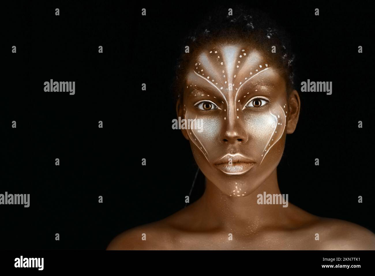 Art photo of Africal woman with tribal ethnic paintings on her face Stock Photo