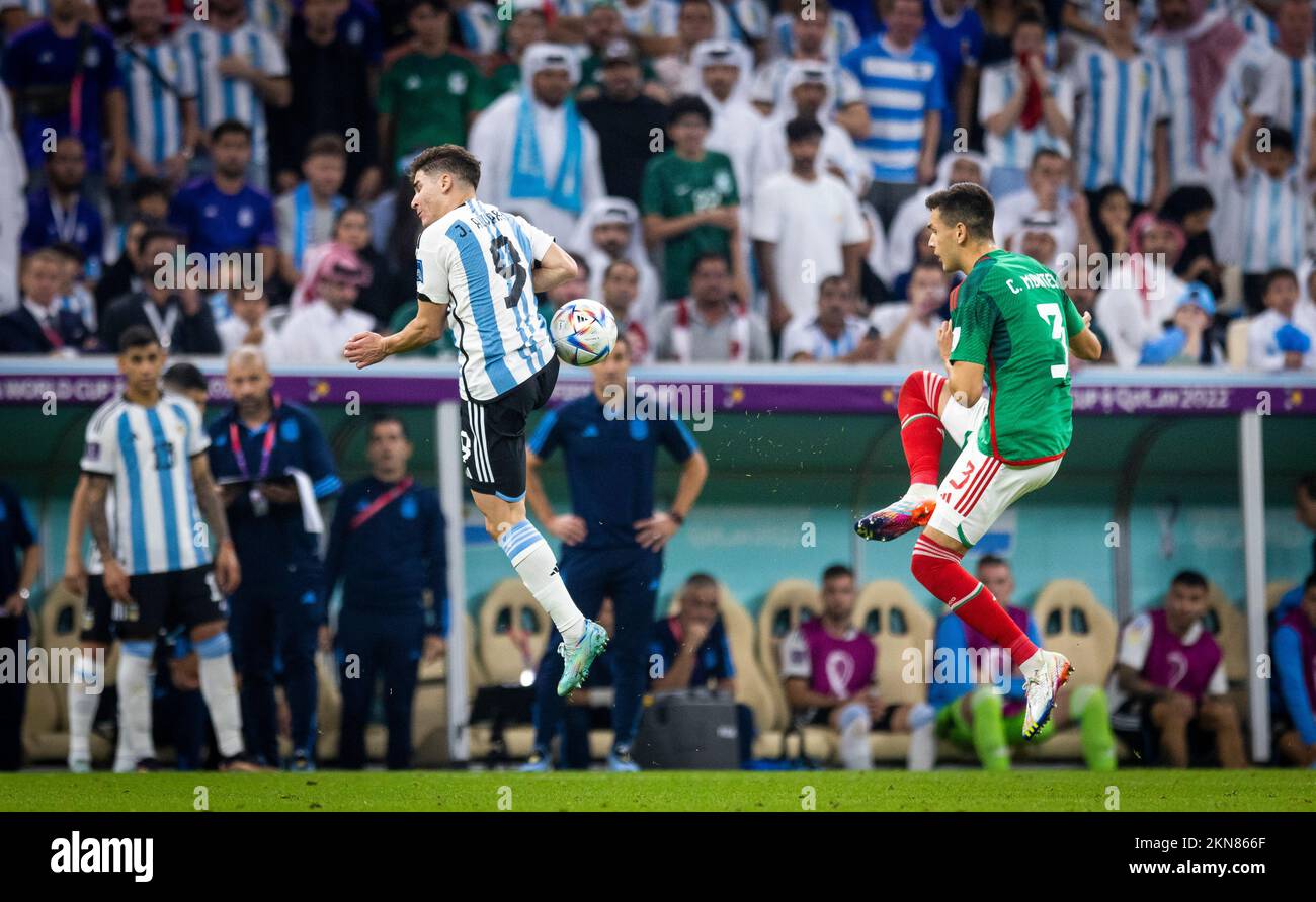 Doha, Qatar. 26th Nov, 2022.  Cesar Montes (Mexiko), Julian Alvarez (Arg) Argentina - Mexico World Cup 2022 in Qatar 26.11.2022 Credit: Moritz Muller/ Stock Photo