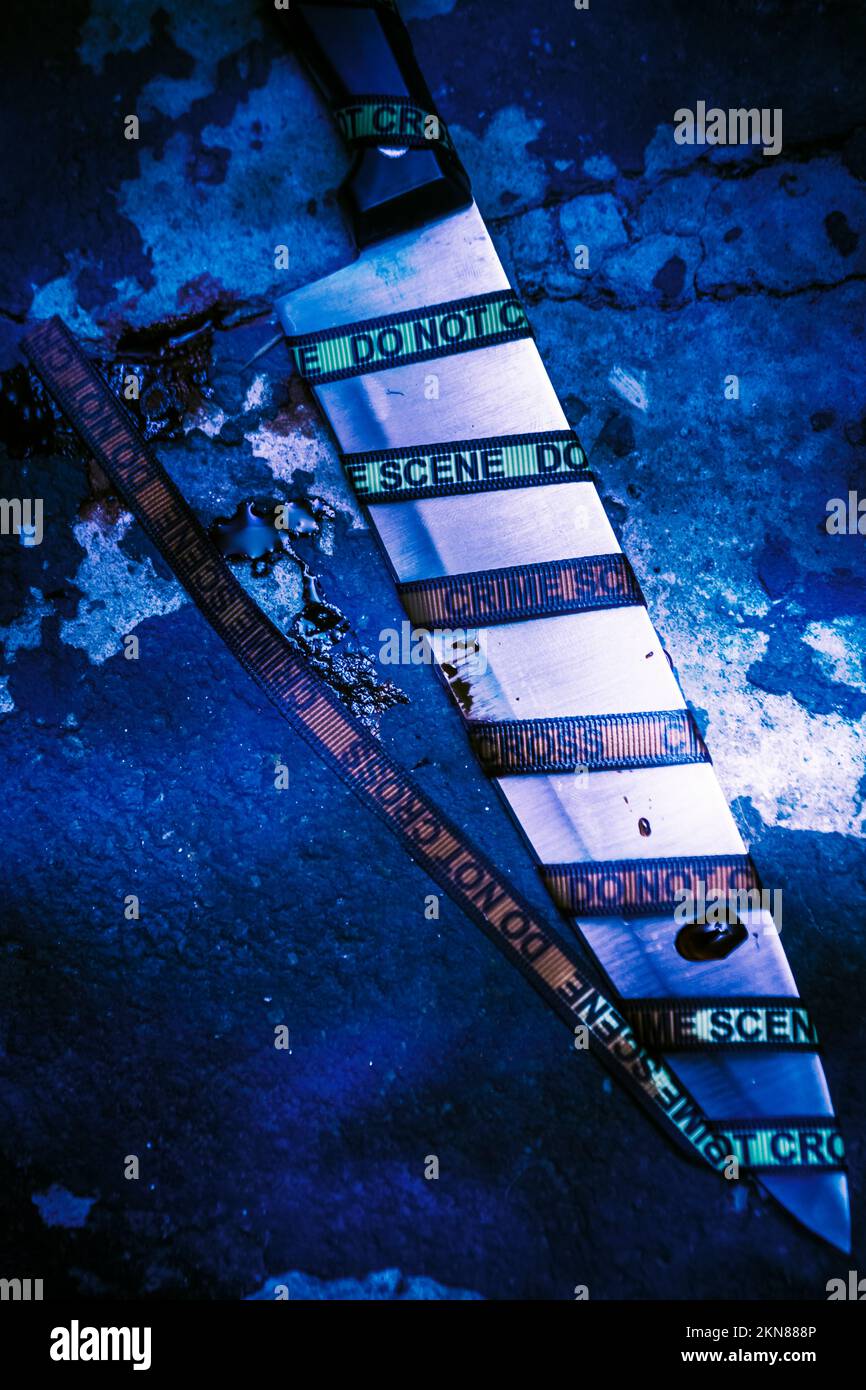 Crime in the killing with a sharp blade laying wrapped up in forensic