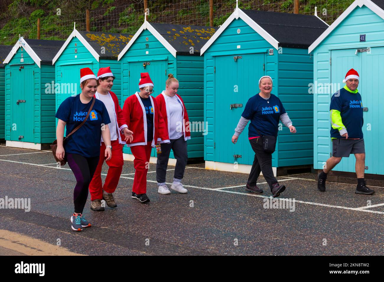 Bournemouth, Dorset UK. 27th November 2022. Supporters of Julias House, a local childrens hospice charity, dress in their Santa suits to run, or walk, the 5km Santa Dash from Bournemouth Pier along the seafront at Bournemouth, raising funds for the charity. Credit: Carolyn Jenkins/Alamy Live News Stock Photo