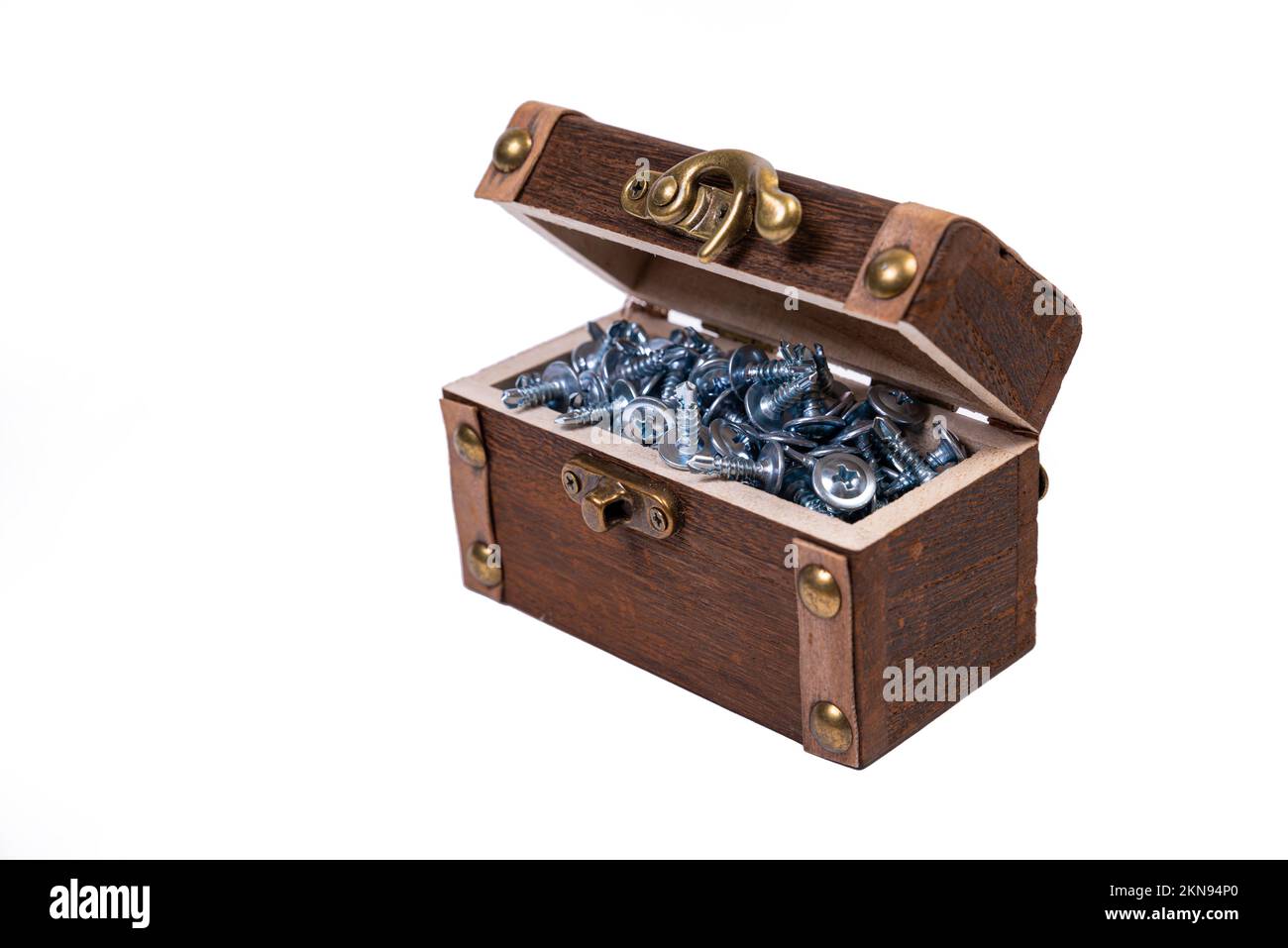 Wooden chest for metal bolts, screws and nuts close up, metal self
