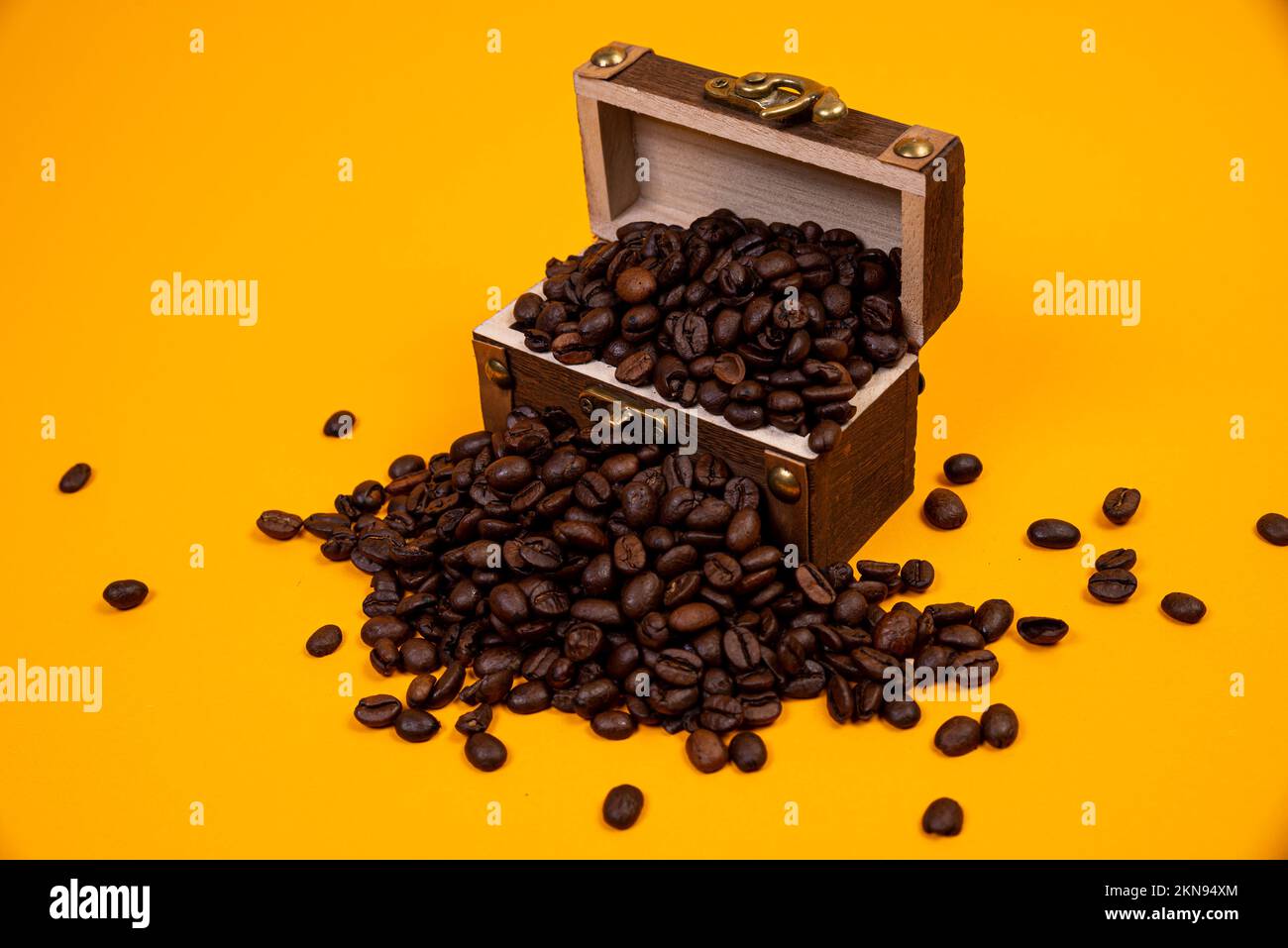 chest with coffee , Image of middleaged coffee beans. Poured into a