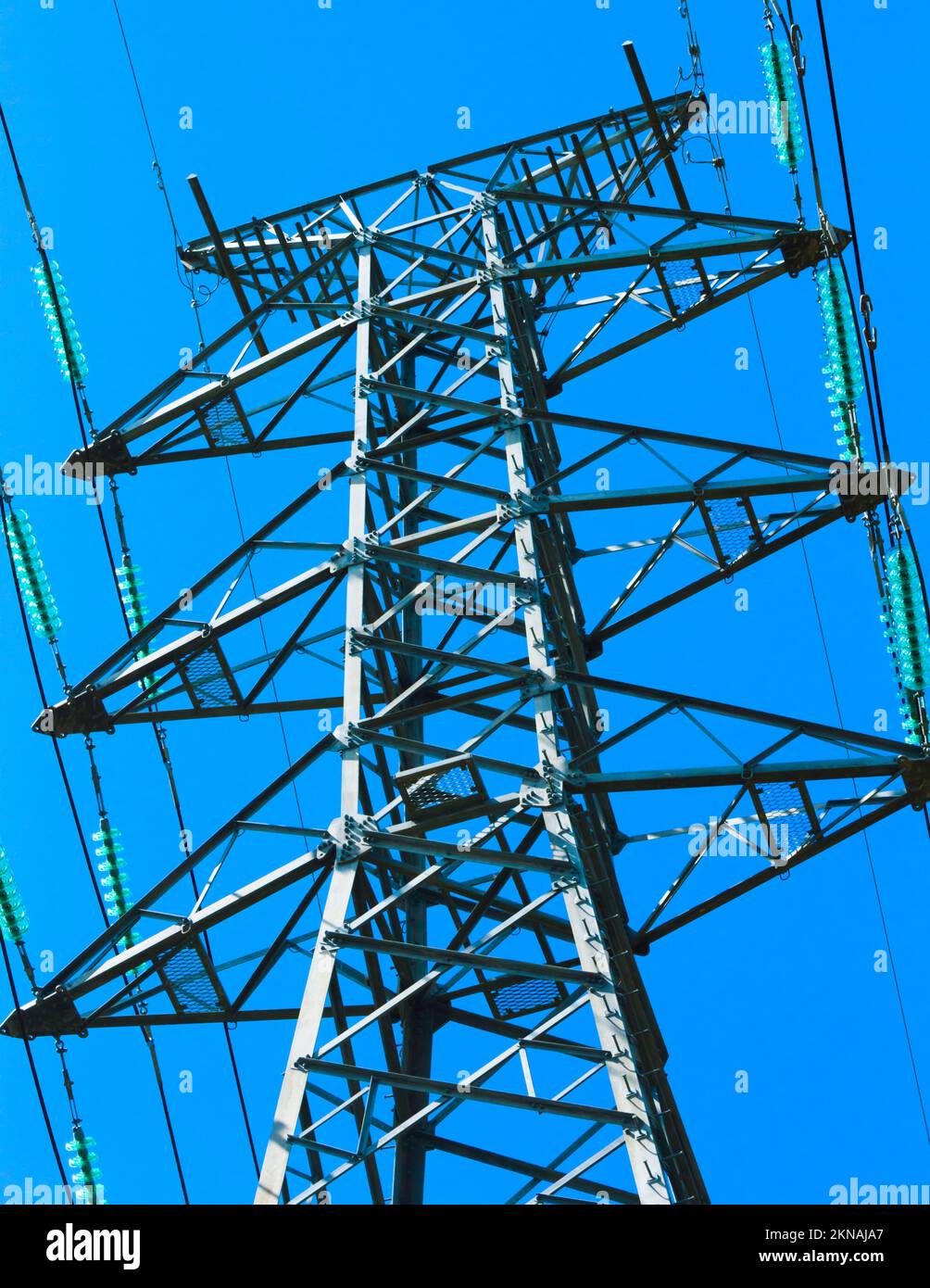 Industrial architecture on a sky bound steel structure of high voltage infrastructure. High energy Stock Photo