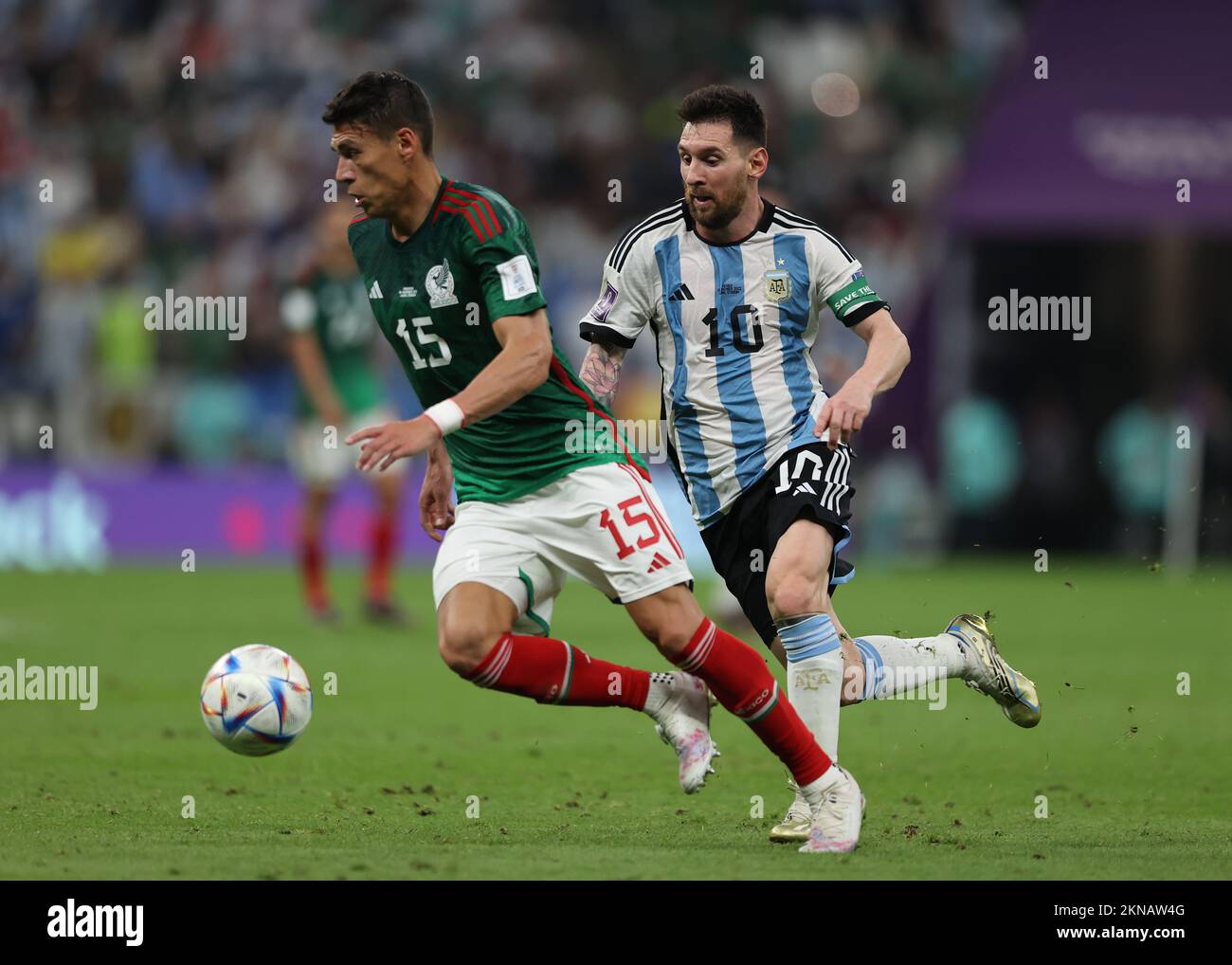 Lusail Iconic Stadium, Lusail, Qatar. 26th Nov, 2022. FIFA World Cup Football, Argentina versus Mexico; Lionel Messi of Argentina chases Hector Moreno of Mexico Credit: Action Plus Sports/Alamy Live News Stock Photo
