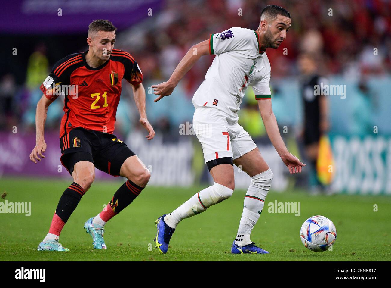 DOHA, QATAR - NOVEMBER 27: Timothy Castagne of Belgium battles for the ball with Hakim Ziyech of Morocco during the Group F - FIFA World Cup Qatar 2022 match between Belgium and Morocco at the Al Thumama Stadium on November 27, 2022 in Doha, Qatar (Photo by Pablo Morano/BSR Agency) Stock Photo