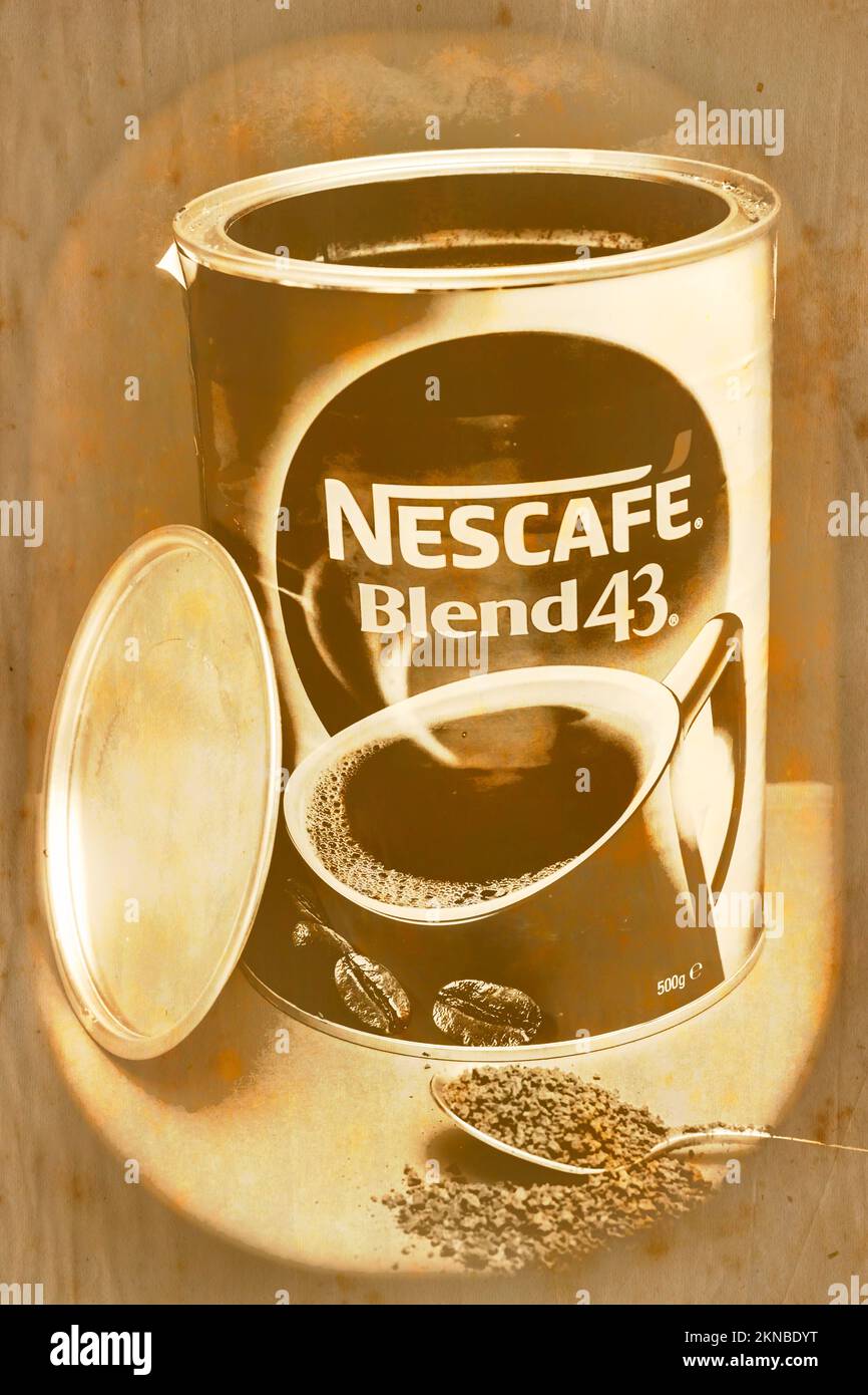 Vintage instant coffee poster art on a tin of Nescafe Blend 43 with old