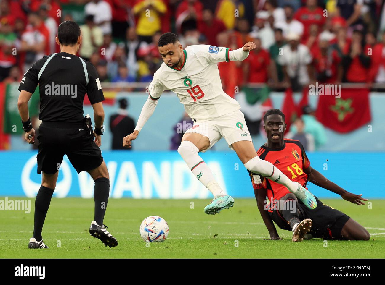 Moroccan Youssef En-Nesyri and Belgium's Amadou Onana pictured in action during a soccer game between Belgium's national team the Red Devils and Morocco, in Group F of the FIFA 2022 World Cup in Al Thumama Stadium, Doha, State of Qatar on Sunday 27 November 2022. BELGA PHOTO BRUNO FAHY Stock Photo