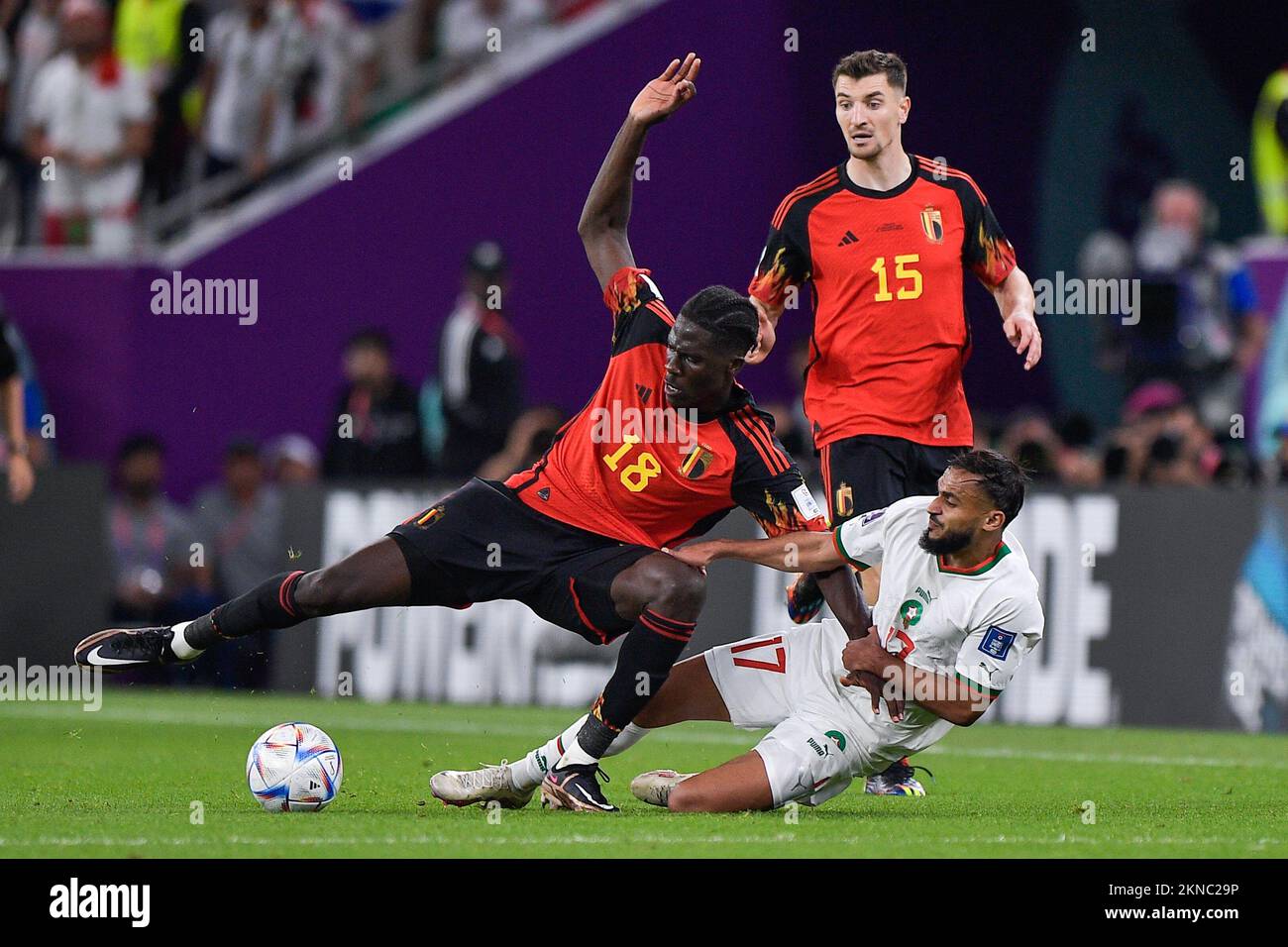 DOHA, QATAR - NOVEMBER 27: Amadou Onana of Belgium battles for the ball with Sofiane Boufal of Morocco during the Group F - FIFA World Cup Qatar 2022 match between Belgium and Morocco at the Al Thumama Stadium on November 27, 2022 in Doha, Qatar (Photo by Pablo Morano/BSR Agency) Stock Photo