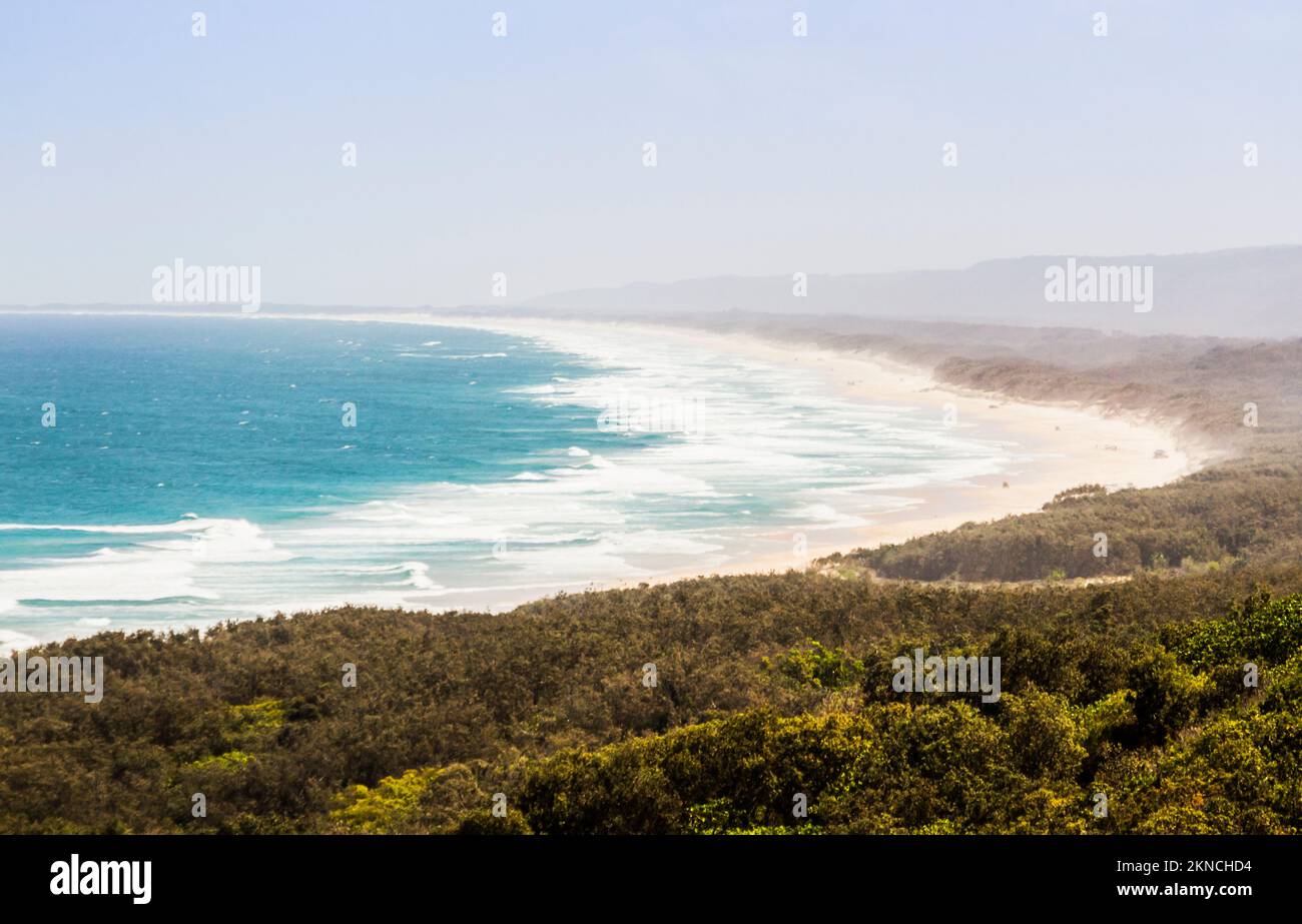 Horizontal waterfront landscape with ocean spray and scenic Australian waves. Captured: Main Beach, Point Lookout, North Stradbroke Island, Queensland Stock Photo