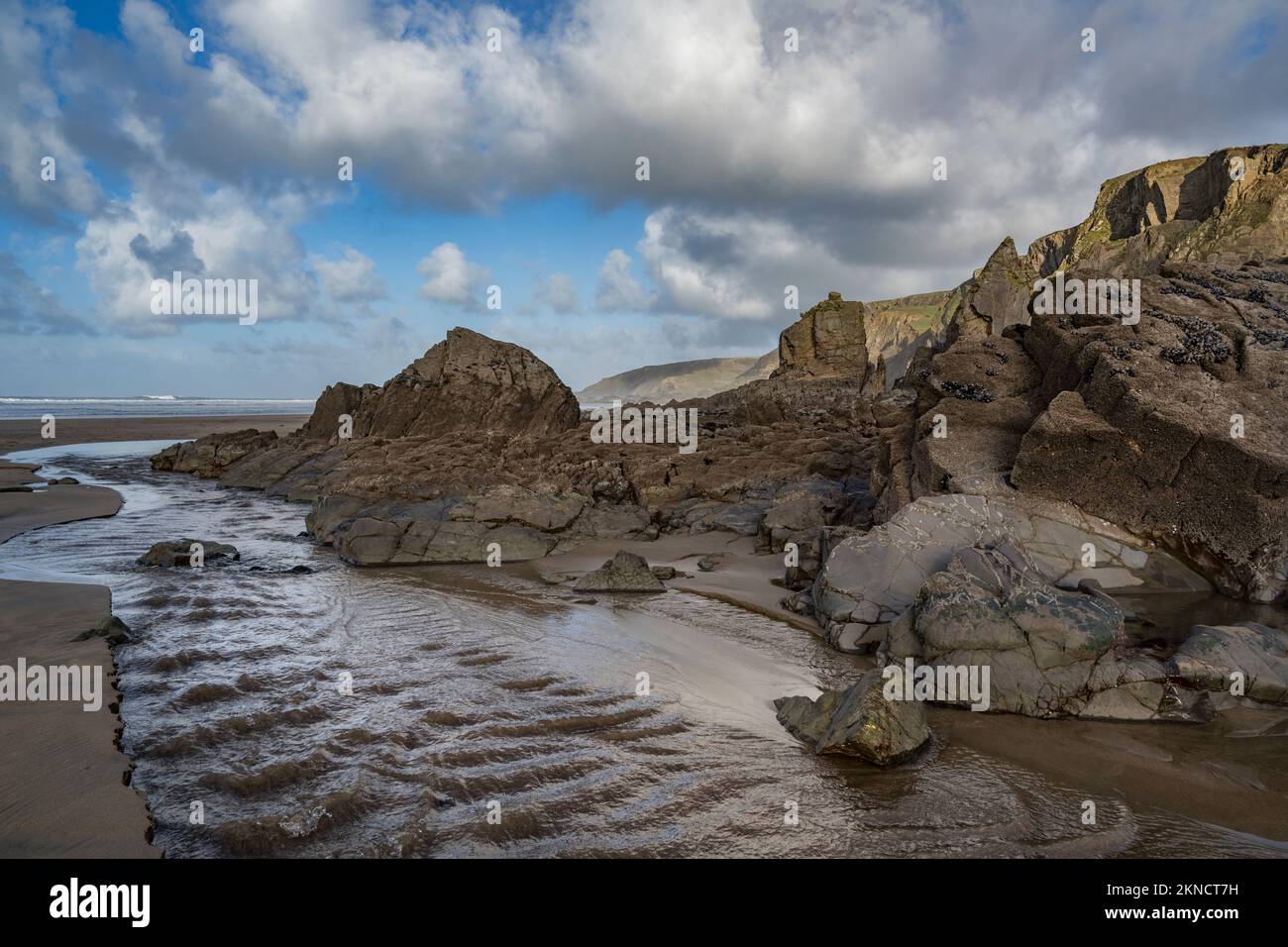 Weather worn rocks at Sandymouth Bay in Cornwall on a beautiful sunny November day Stock Photo