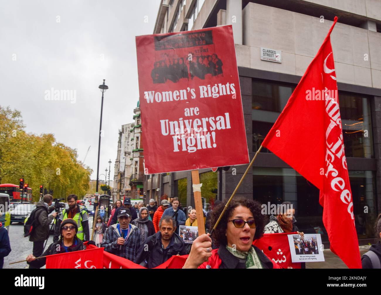 London, England, UK. 27th Nov, 2022. A protester in Piccadilly holds a