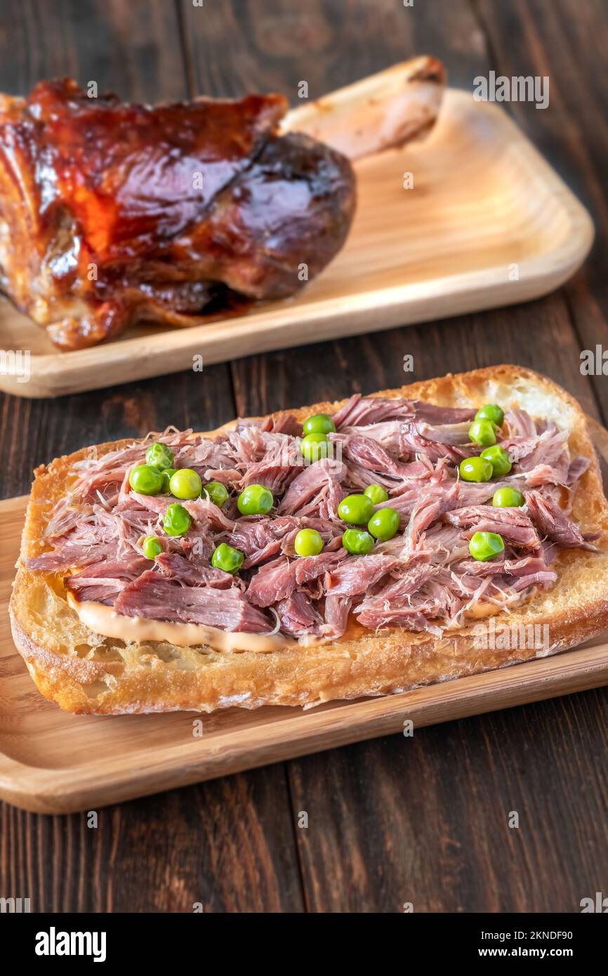 Sandwich with ham hock meat on the plate Stock Photo