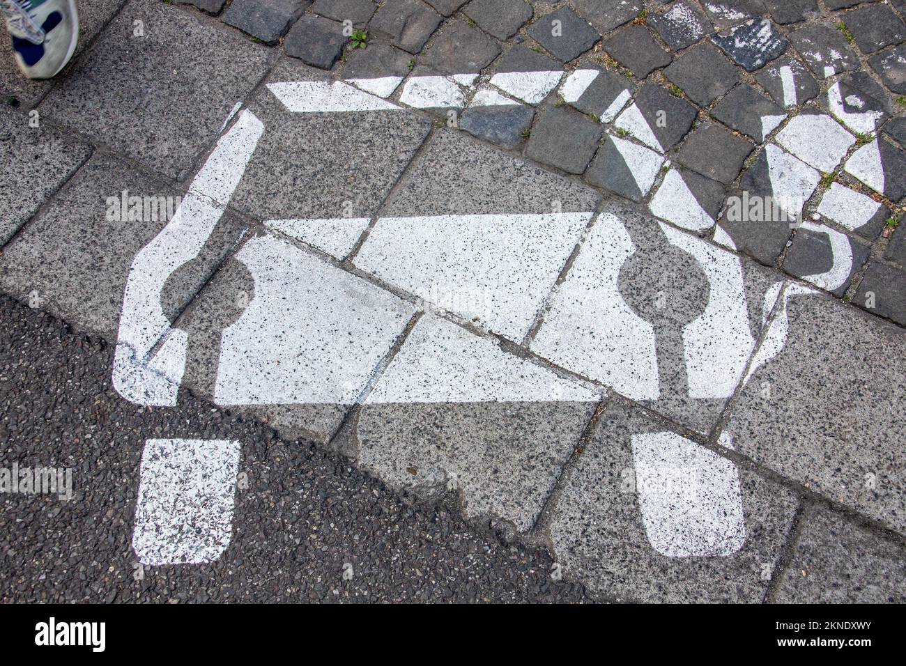 Space reserved for EV electric vehicle charging, Saarbruck, Germany Stock Photo