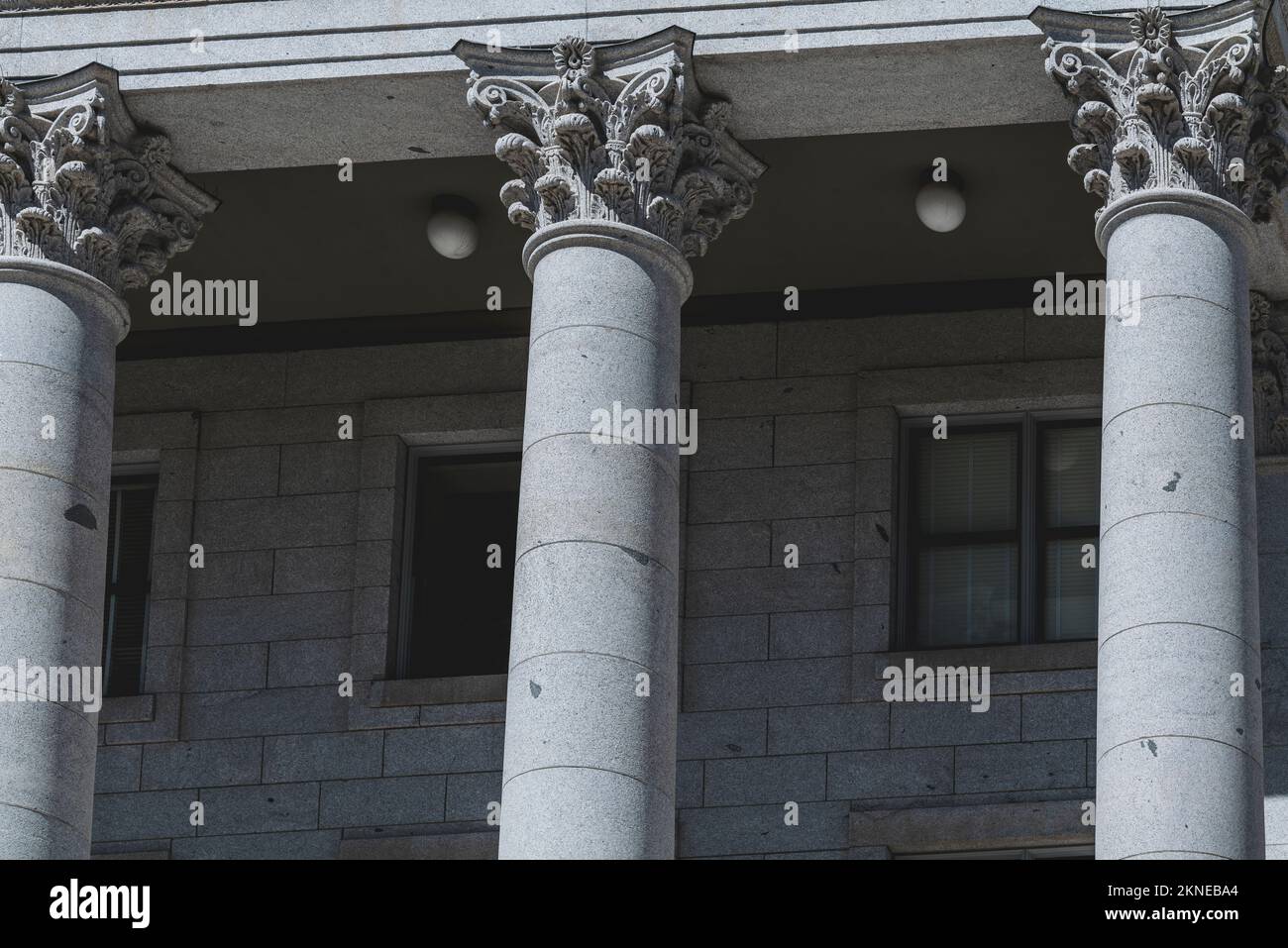 The architecture of buildings windows, stucco molding, and columns on a ...