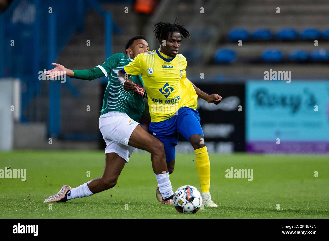 Lommel's Rafik Belghali and Beveren's Taofeek Ismaheel pictured in ...