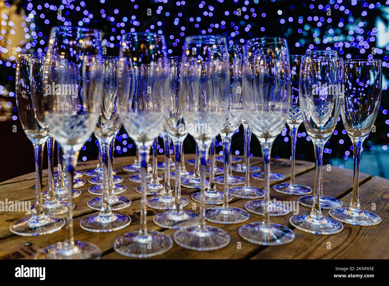 Champagne glasses in preparation for festive season. Stock Photo