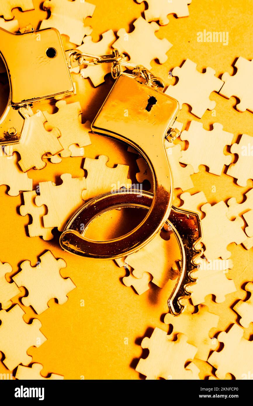 Unsolved mystery in the unlocking of a cuffs and unresolved puzzles. Open Guilt Stock Photo