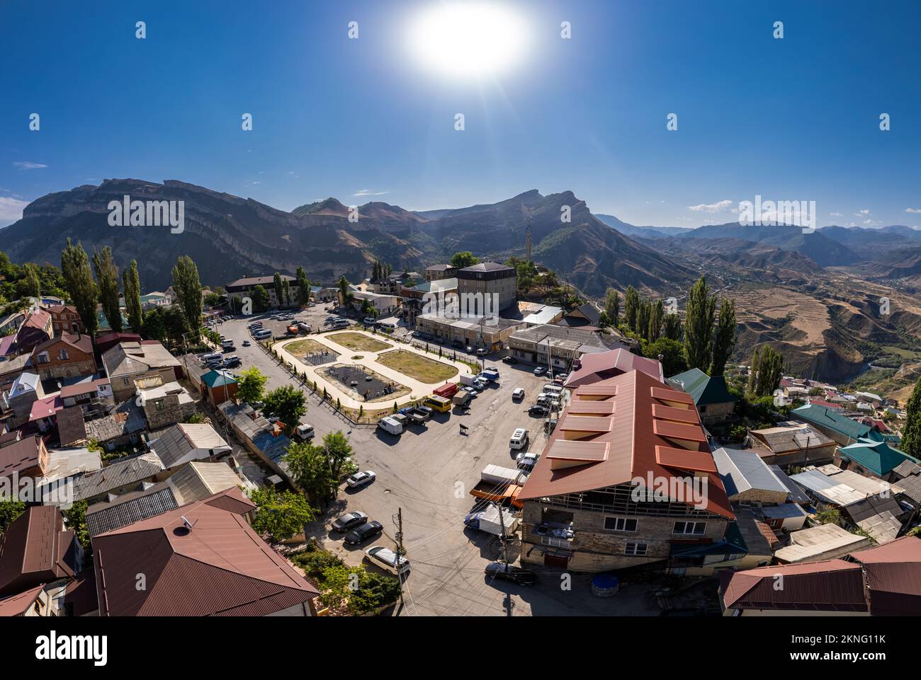 Aerial top view to village Gunib and famous attraction Memorial 'White cranes' in Victory Park. Famous village among the mountains and rocks. Summer s Stock Photo
