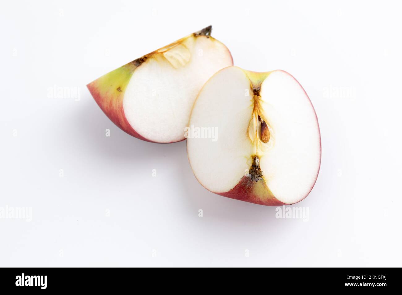 red apple slice isolated, cut apple on white background, organic products Stock Photo