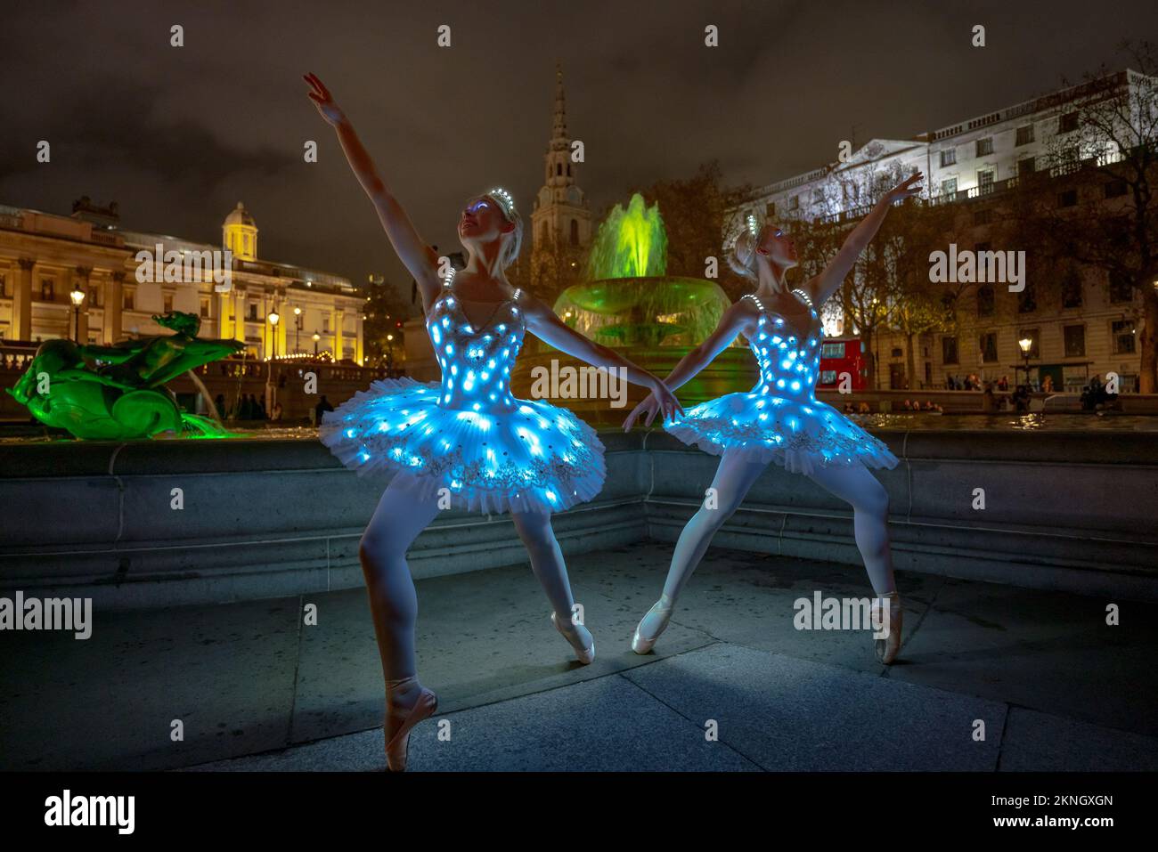 London, UK. 27th November, 2022. Christmas Ballerinas: Twins Abigail and  Lauren Everard(L-R), both graduates in classical ballet from London Studio  Centre (LSC) theatre dance school, practise some moves wearing specialised  LED ballet