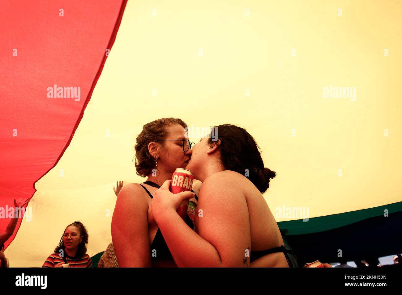 Rio De Janeiro, Brazil. 27th Nov, 2022. RJ - Rio de Janeiro - 11/27/2022 -  RIO DE JANEIRO, LBGTI PRIDE PARADE - Women are seen kissing during the  LGBTI pride parade held