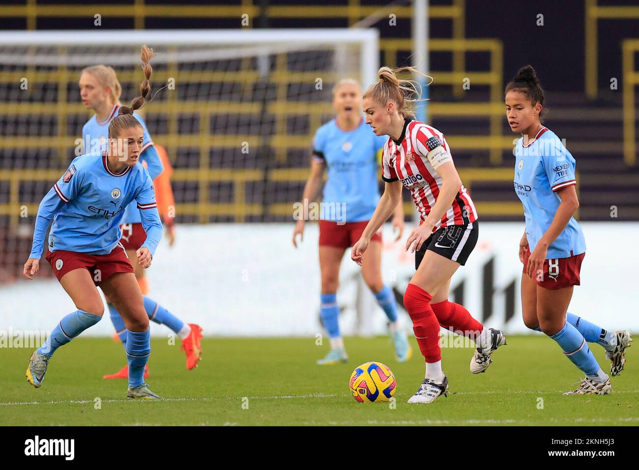 Manchester, UK. 27th Nov, 2022. Emma Kelly #14 of Sunderland runs with the ball watched by Filippa Angeldal #12 of Manchester City during the FA Womens Continental League Cup match Manchester City Women vs Sunderland AFC Women at Etihad Campus, Manchester, United Kingdom, 27th November 2022 (Photo by Conor Molloy/News Images) in Manchester, United Kingdom on 11/27/2022. (Photo by Conor Molloy/News Images/Sipa USA) Credit: Sipa USA/Alamy Live News Stock Photo