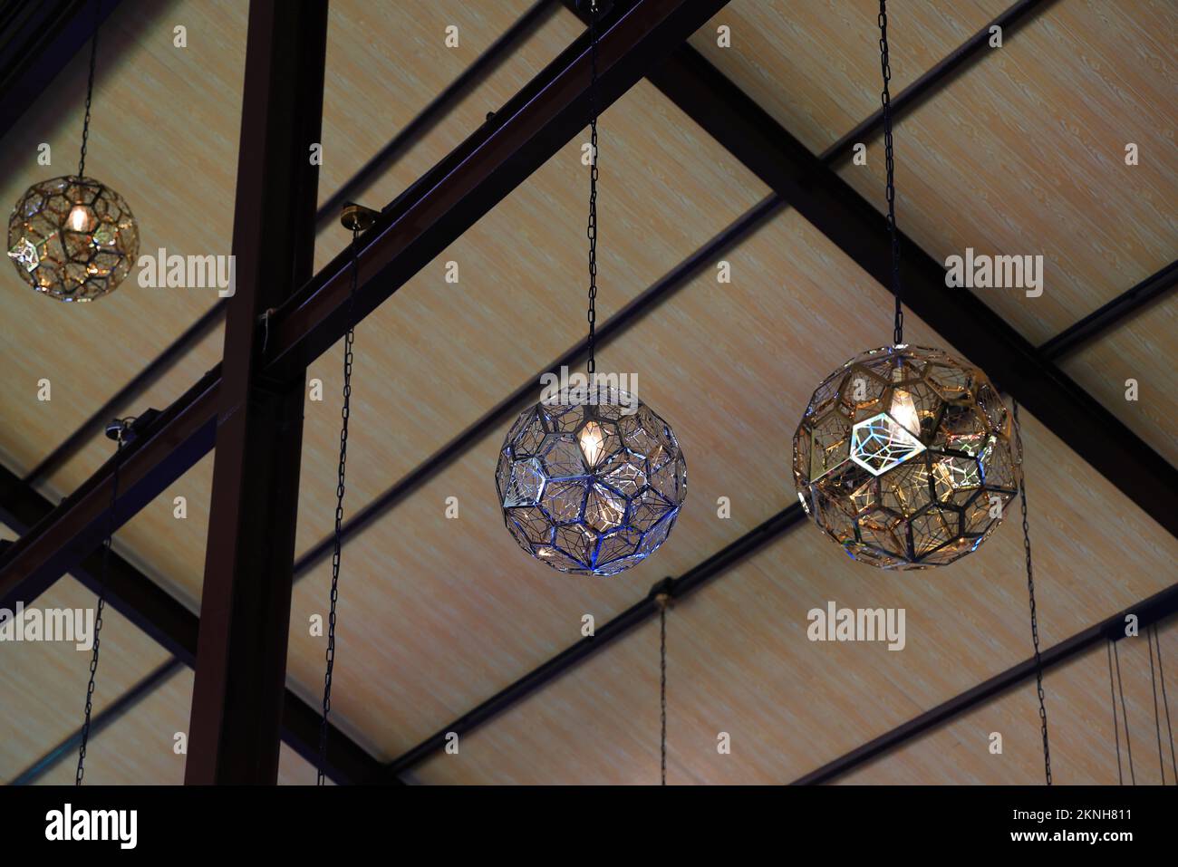 Beautiful modern decorative lamp hanging from the ceiling Stock Photo