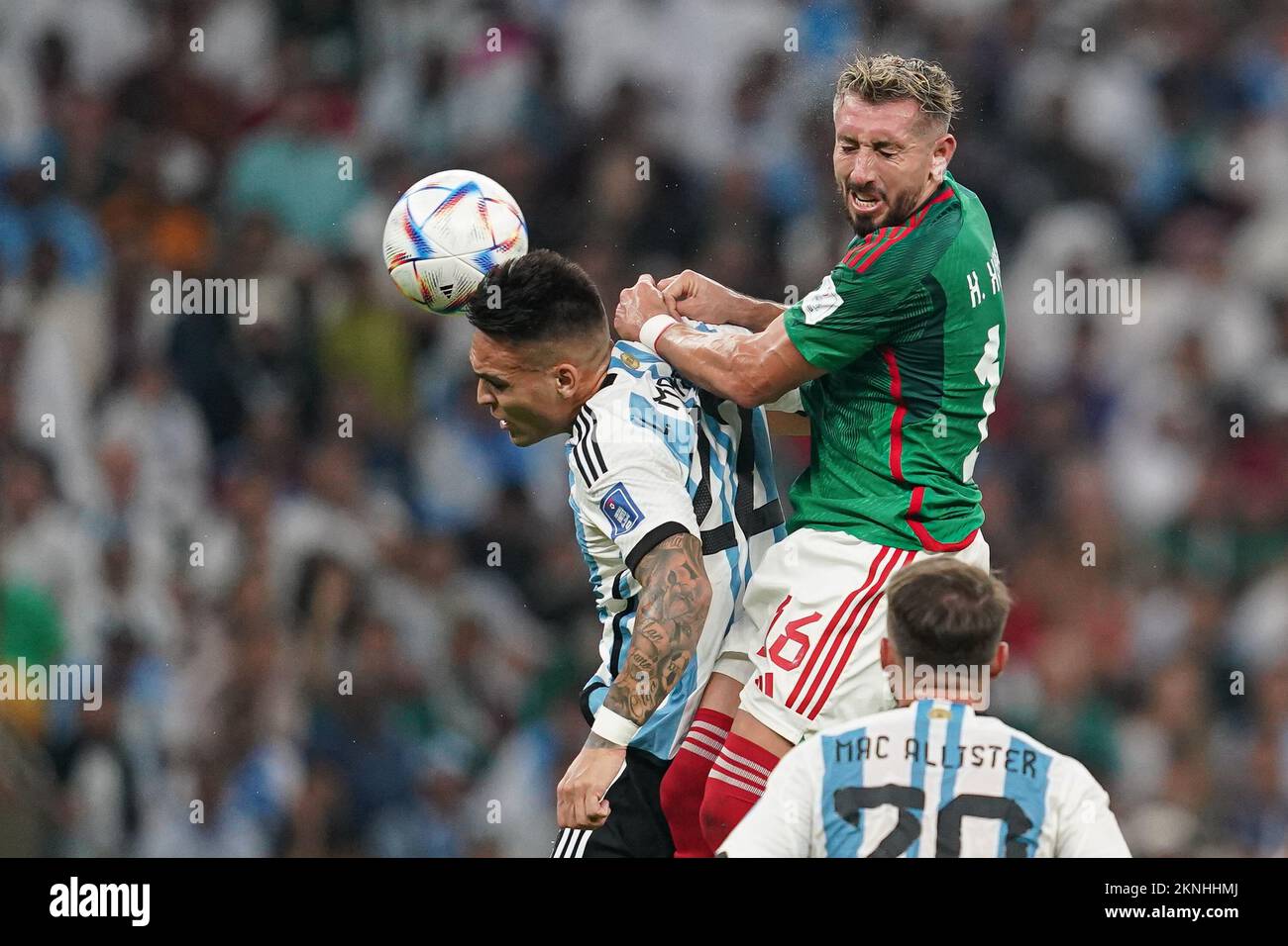LUSAIL, QATAR - NOVEMBER 26: Player of Argentina Lautaro Martínez fights for the ball with player of Mexico Héctor Herrera during the FIFA World Cup Qatar 2022 group C match between Argentina and Mexico at Lusail Stadium on November 26, 2022 in Lusail, Qatar. (Photo by Florencia Tan Jun/PxImages) Stock Photo