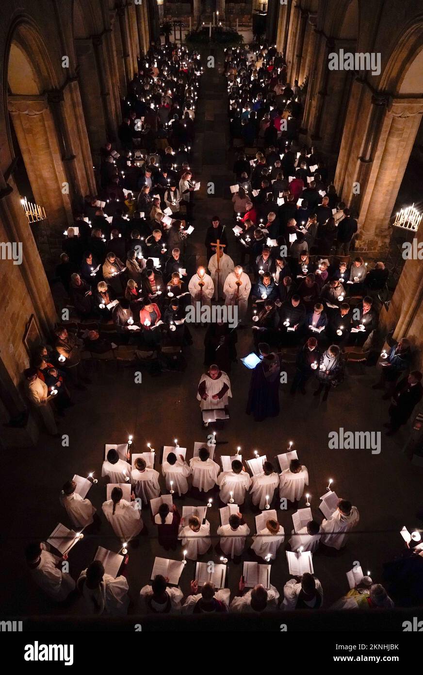 Choristers sing during the Advent procession at Chichester Cathedral to mark the beginning of the Advent season. Picture date: Sunday November 27, 2022. Stock Photo